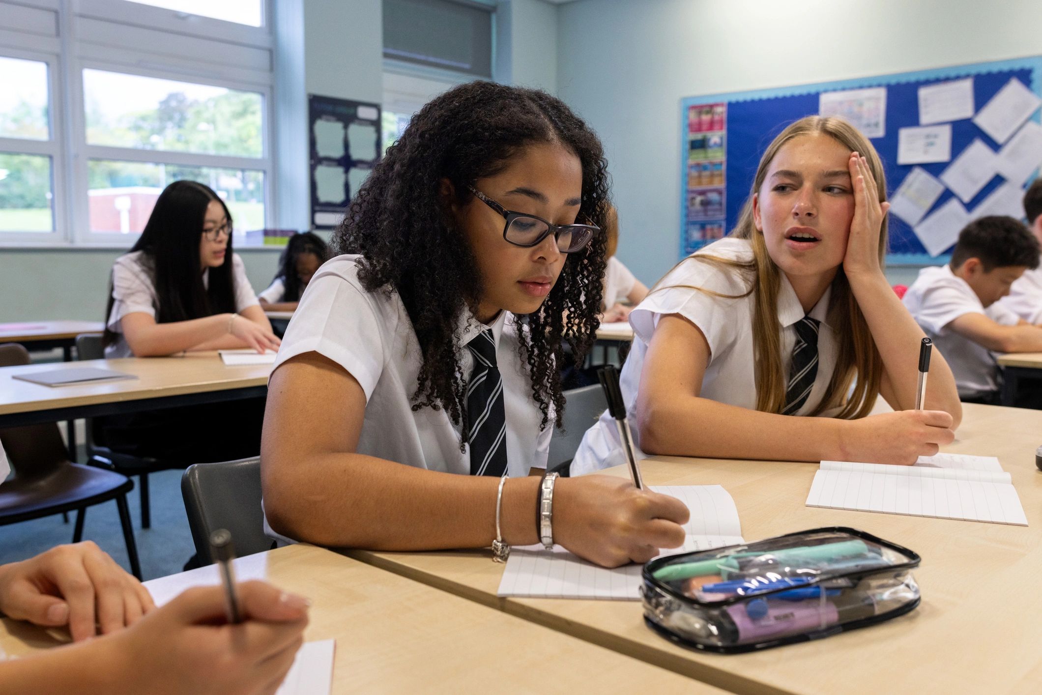 Students working together in a classroom